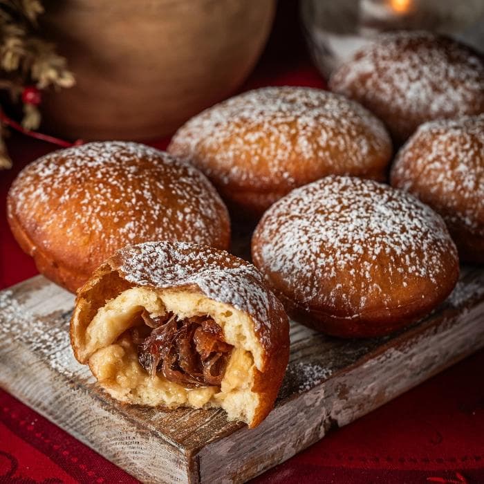Four Ukrainian Christmas pampukhy with rose jam in a large box