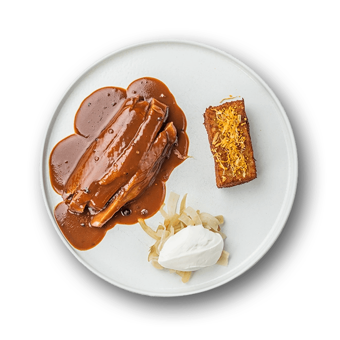 Roasted duck with baked grated potatoes and gooseberry compote with preserved apples