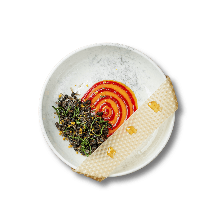 A starter made from edible bees with hot pepper, honey, and two sauces, inspired by Ukrainian traditional practices.